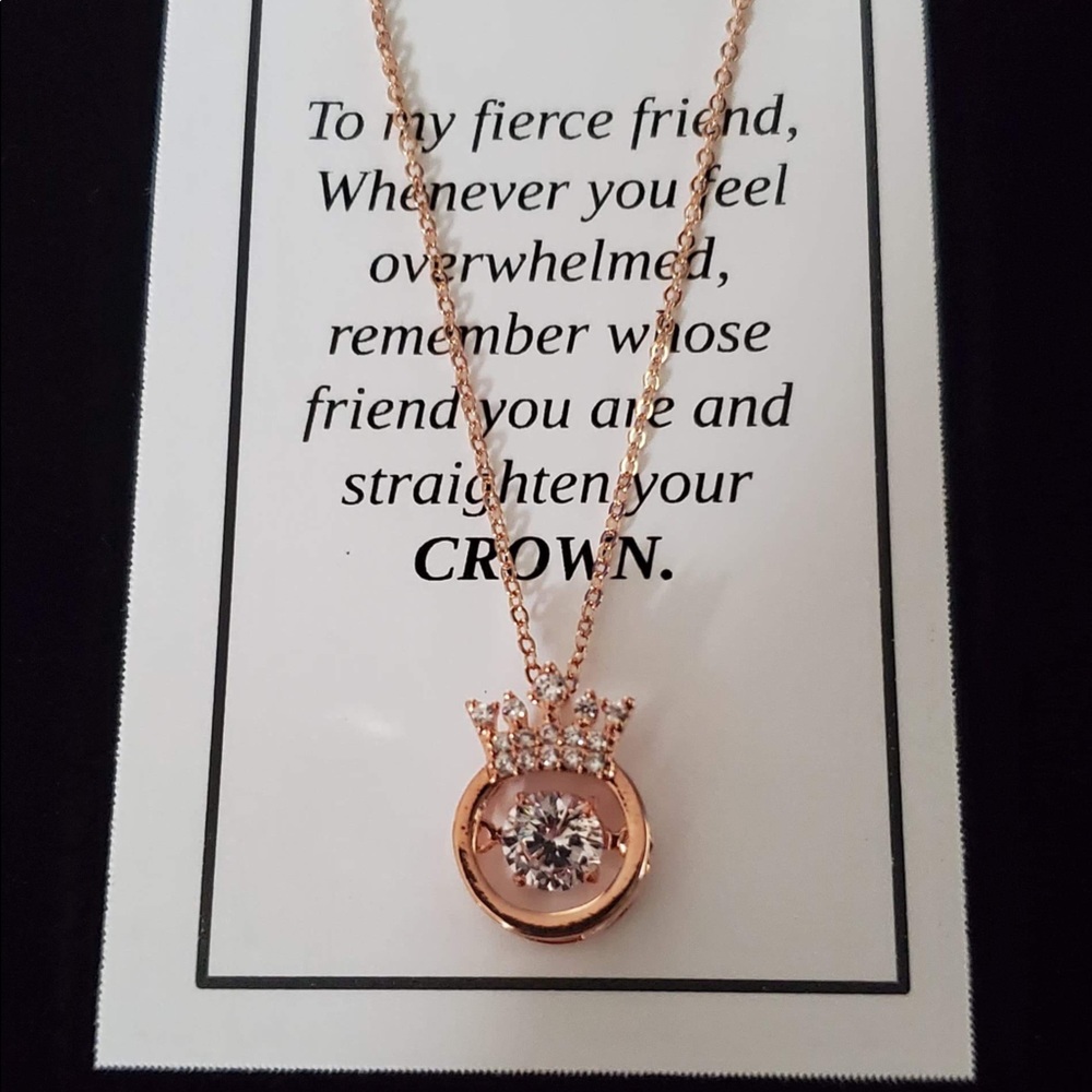 Beautiful rose gold crown necklace.